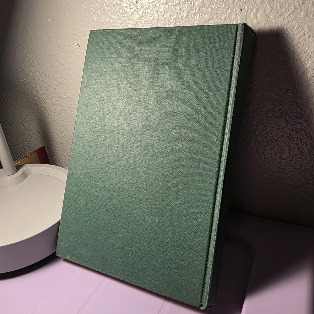 Green Hardcover Book with Gold Design
